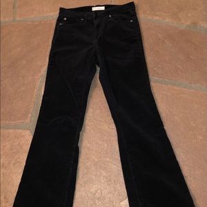 Women’s Black corduroy bootcut jeans.